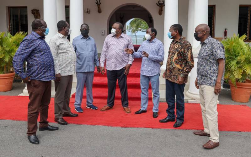 President Uhuru Kenyatta and Raila Odinga with the OKA alliance principals at the State House in Mombasa