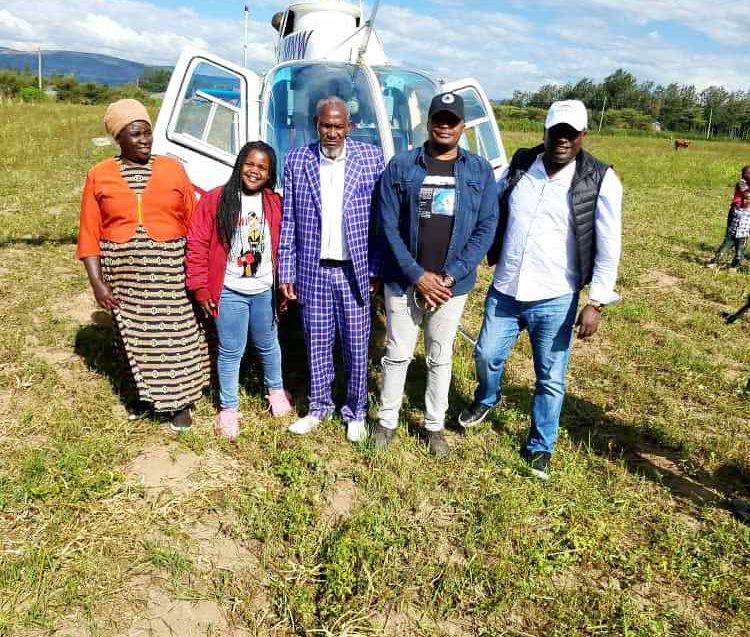 Mzee James Njoroge in suit welcomes Starehe MP Charles Kanyi Jaguar in black cap and Businessman Jorum Mwangi in White cap at his Bahati Farm in Nakuru