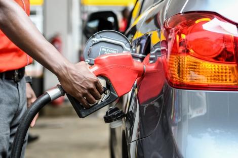 An Image of a Car Fuelling At a Petrol Station