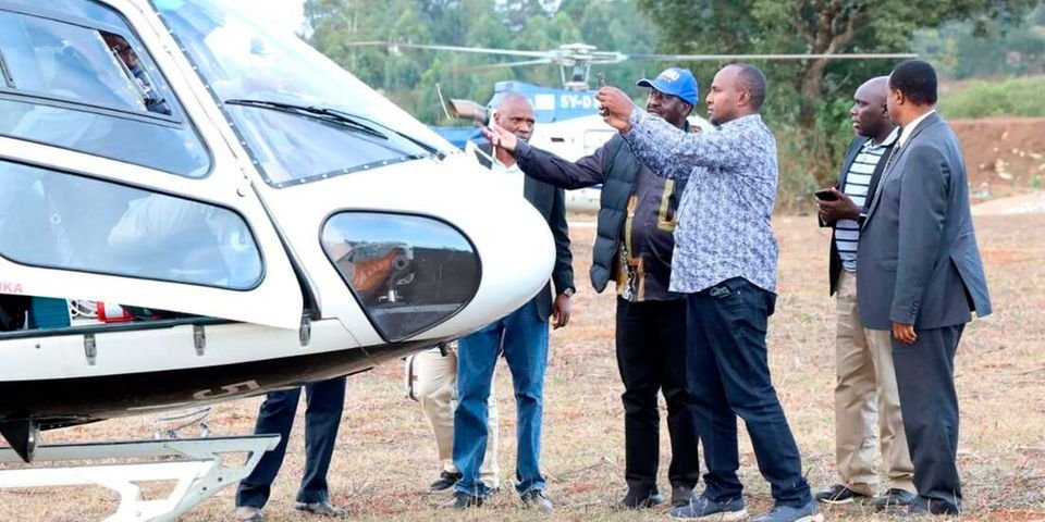 Raila and Junet Mohammed at the helicopter scene